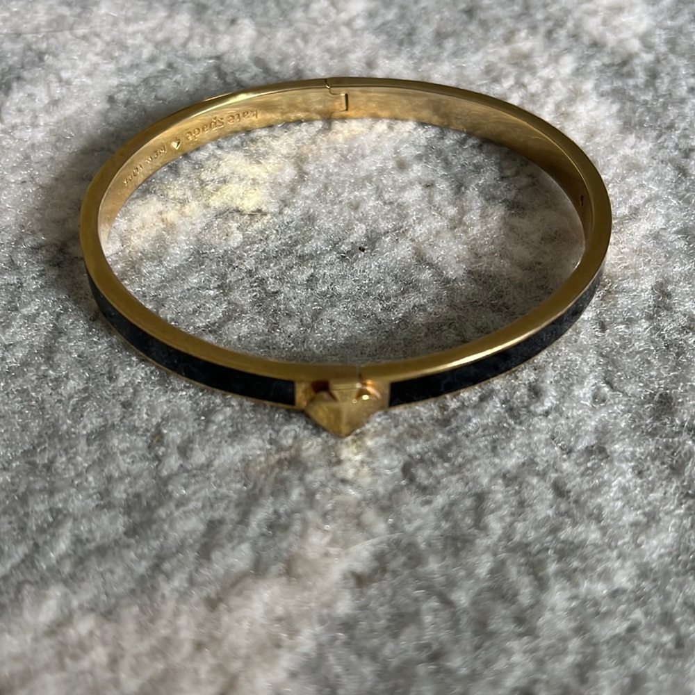 Kate Spade gold and black bangle bracelet